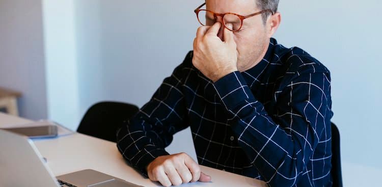 person unhappy at work