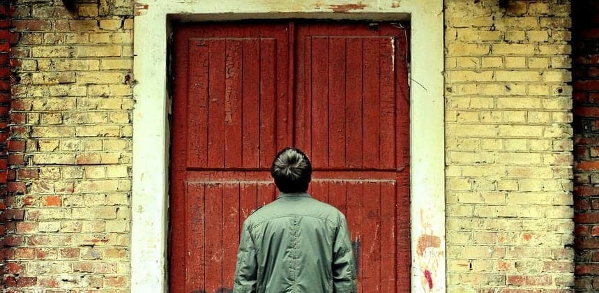person at door
