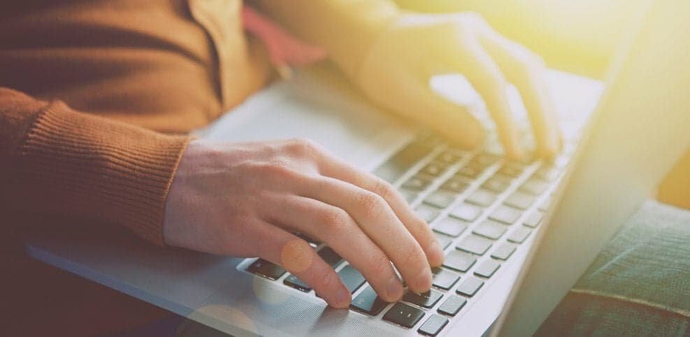 person writing email