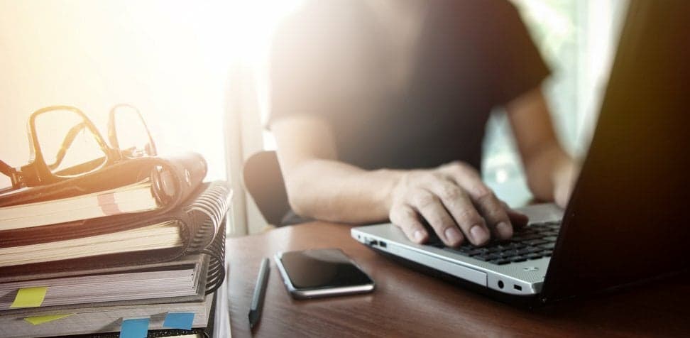 person on computer