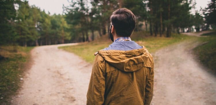 man choosing which path to take