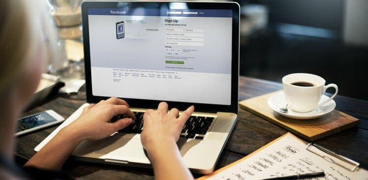 woman using Facebook