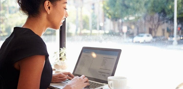 person on computer