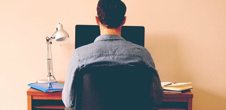 man on computer
