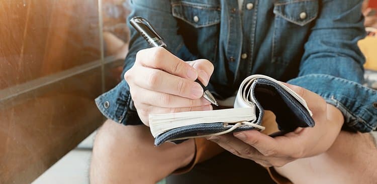man writing