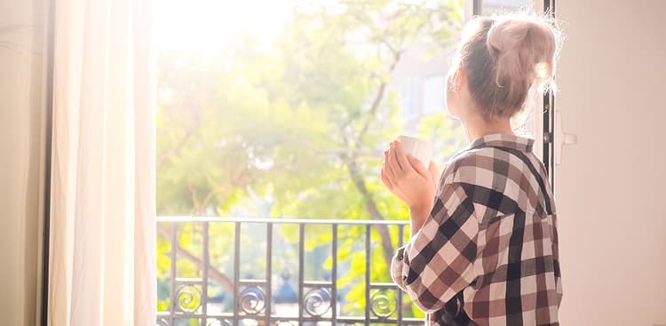 woman looking outside
