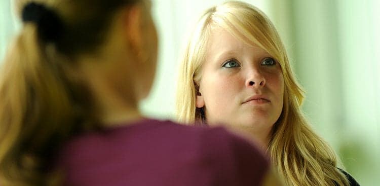 serious woman in meeting
