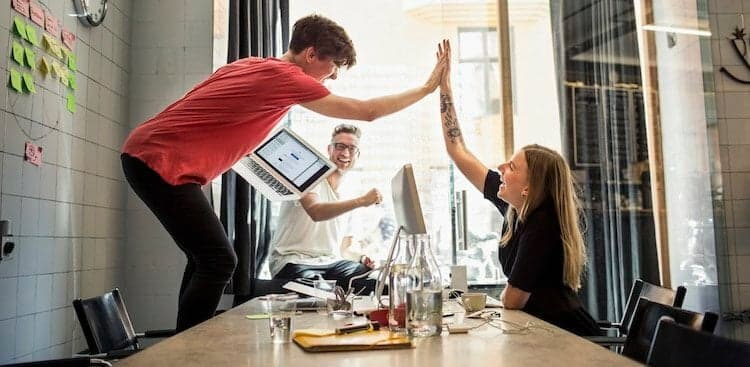 people high-fiving