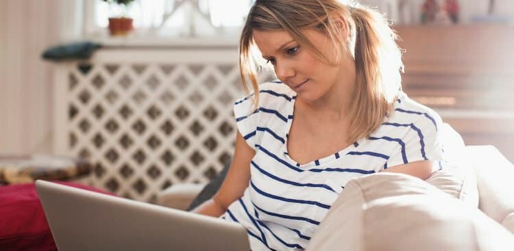 person on laptop at home