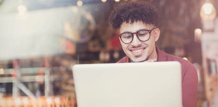 person on computer