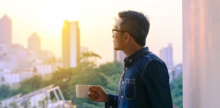 man with cup