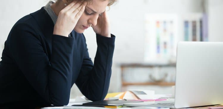 person stressed at work