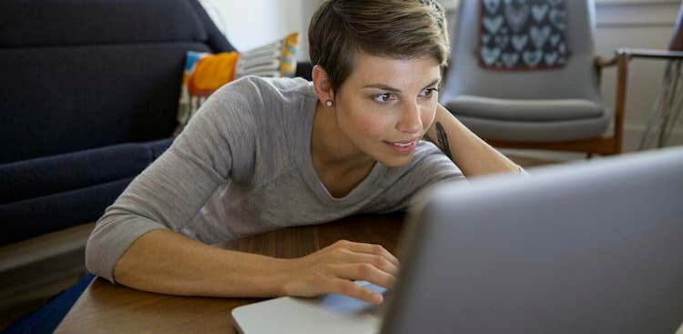 person at home on laptop