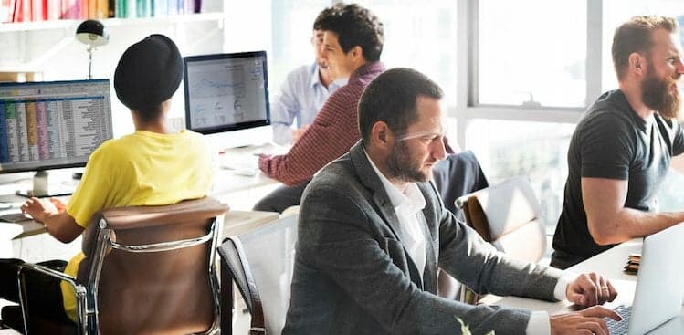 team working hard courtesy rawpixel/Getty Images