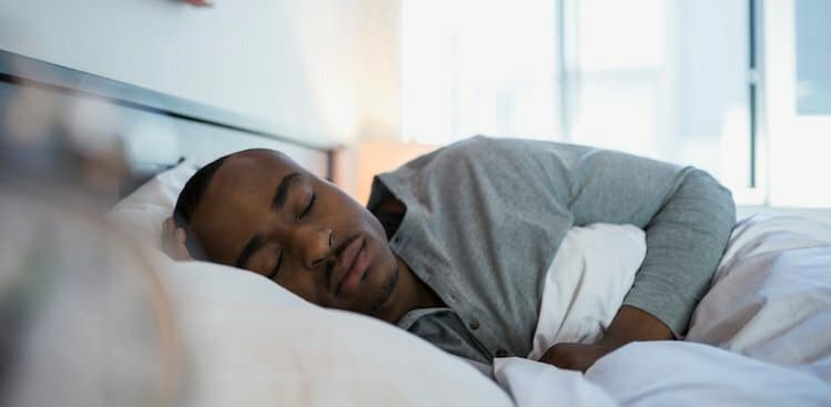 man sleeping peacefully courtesy Hero Images/Getty Images