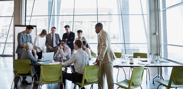 people in meeting in office