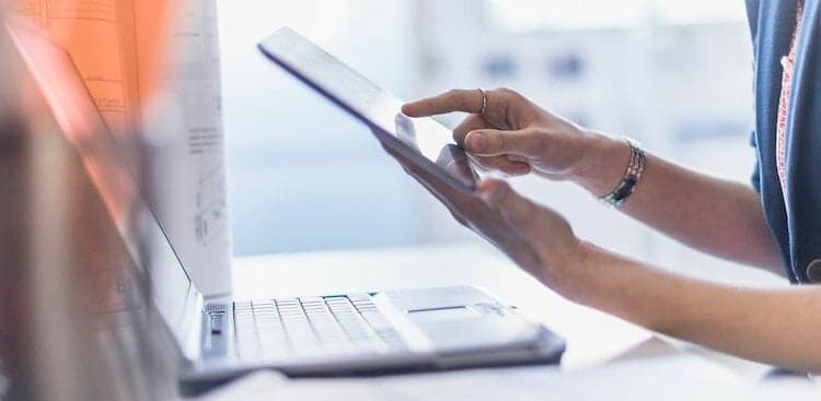 person on tablet