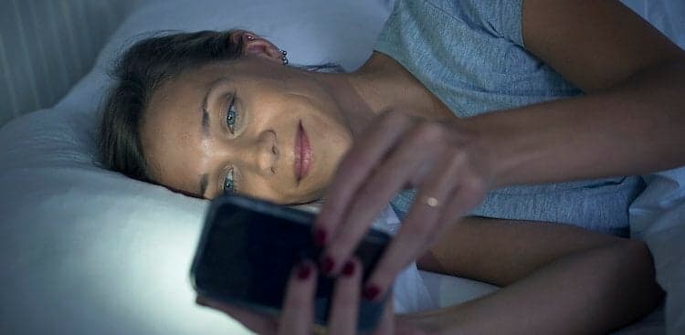 person in bed