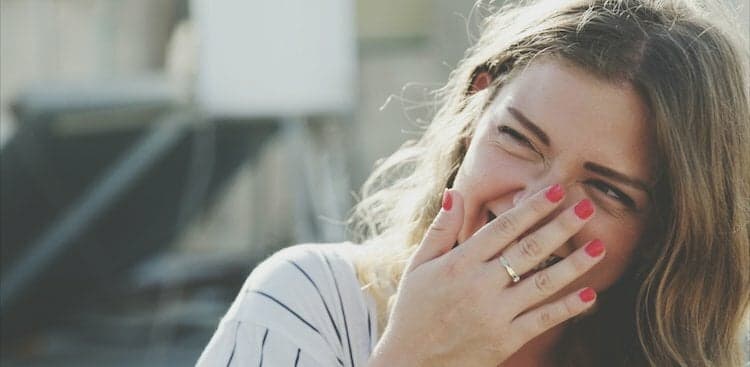person covering mouth
