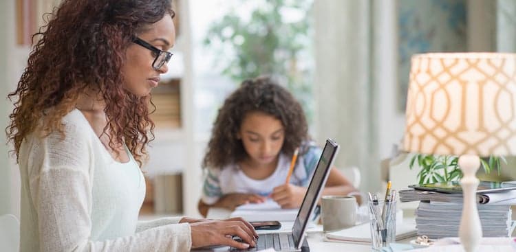 photo of woman on computer