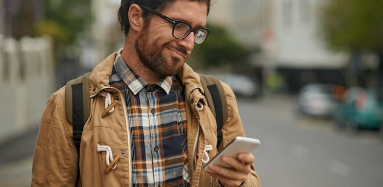 person confused on phone