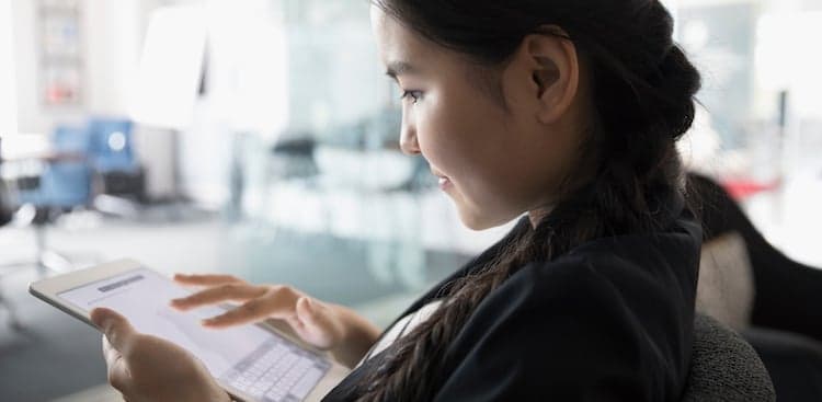 person on tablet