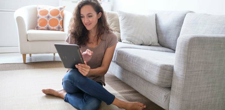 person on tablet