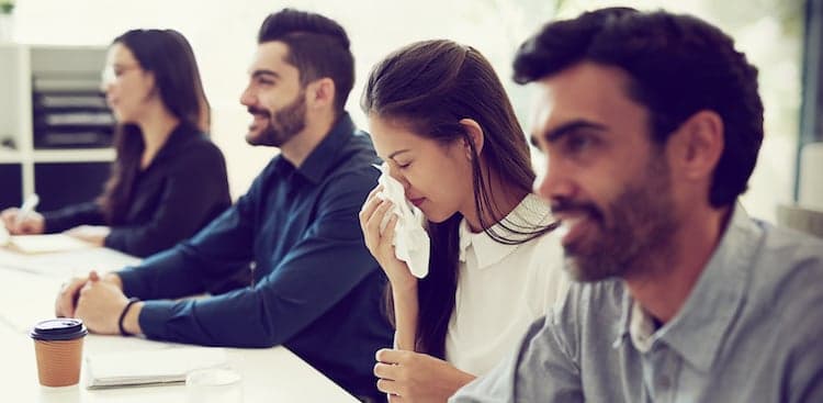 person sick in meeting