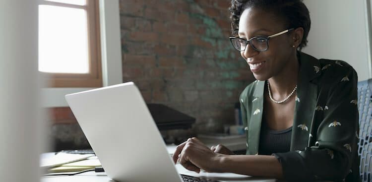 person on computer