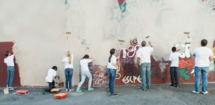 people painting wall