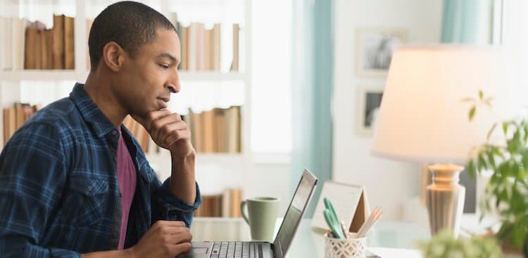 person on computer