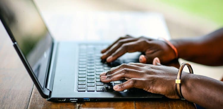 person on computer