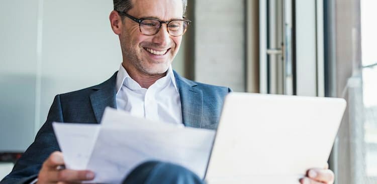 person looking at documents