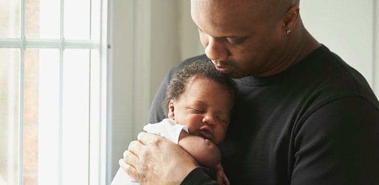dad at home with baby