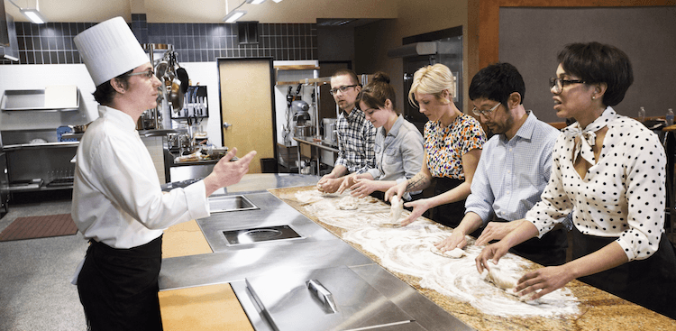 people taking a cooking class