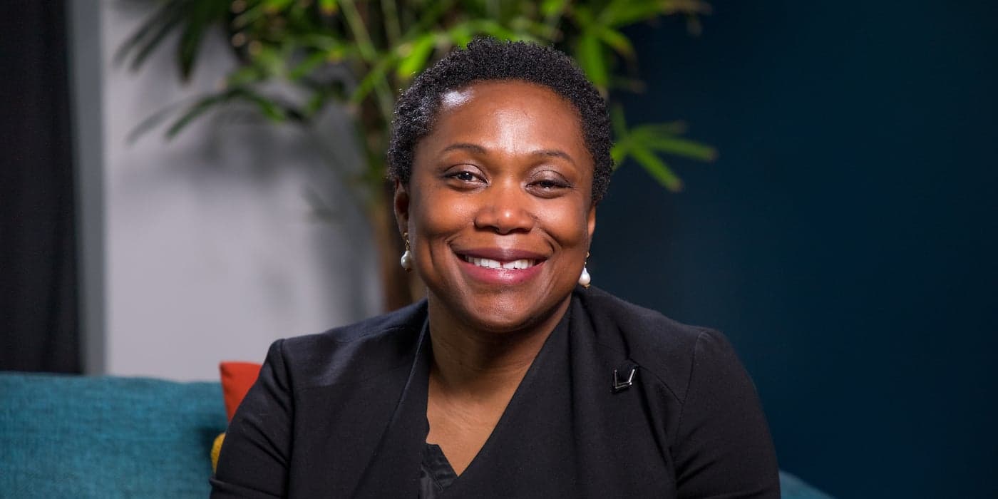 Woman with short hair smiling