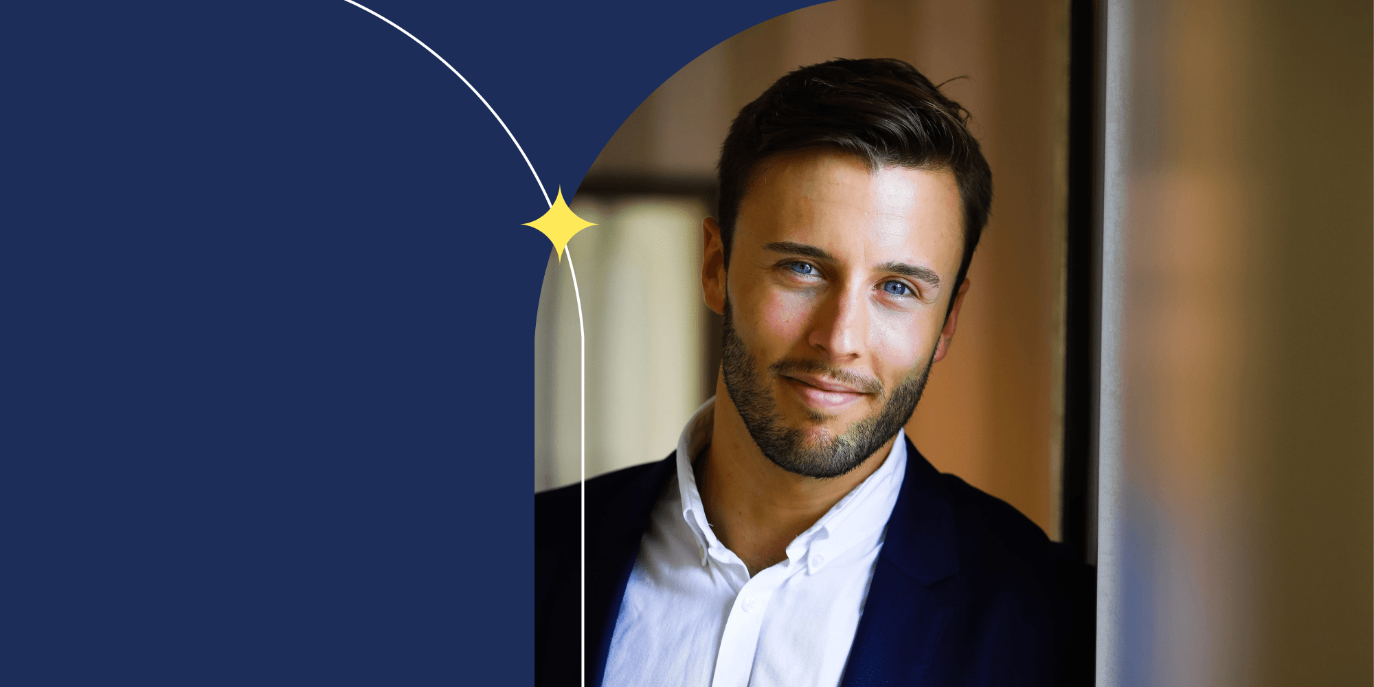 A person dressed in a white shirt and dark blazer, facing the camera.