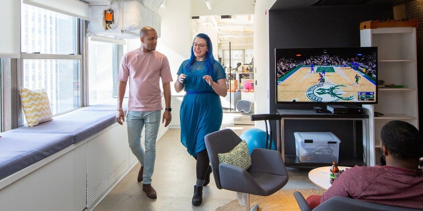 employees walking around an office