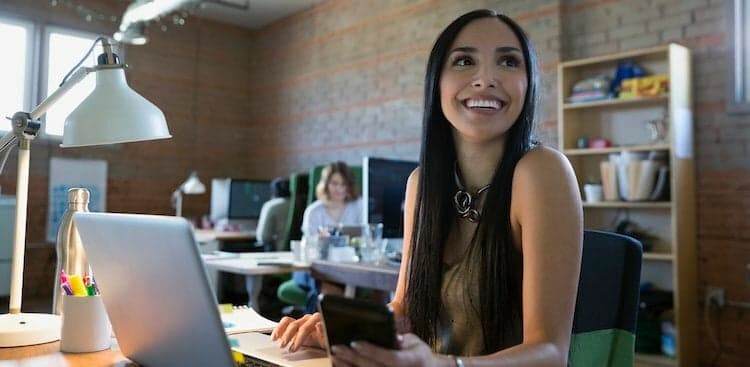 person confident at desk
