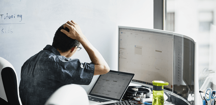 person looking at a calendar on their computer