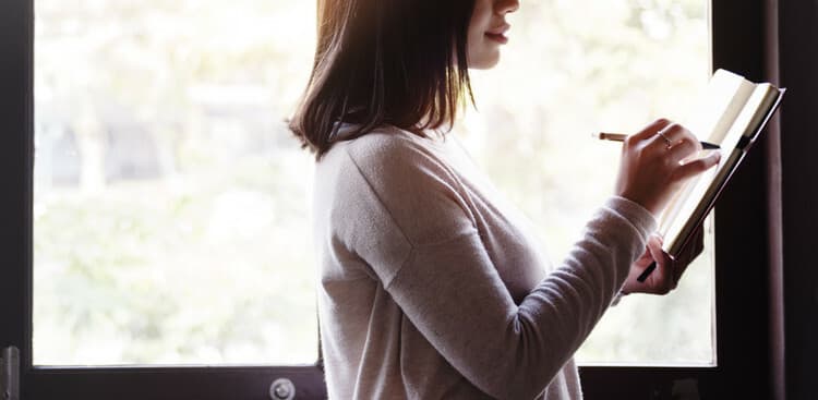 woman using notebook