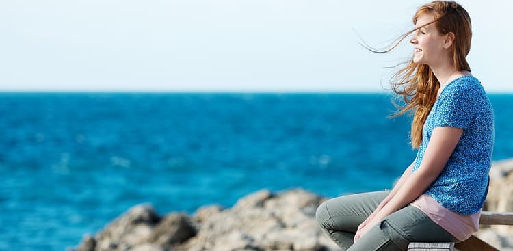 woman happy on beach